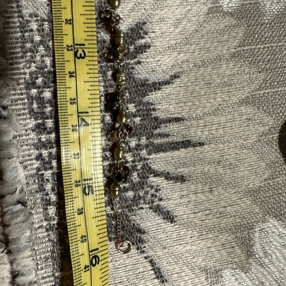 Beautiful amber stone hangs from chain with delicate clusters of small beads. - Picture 8 of 13